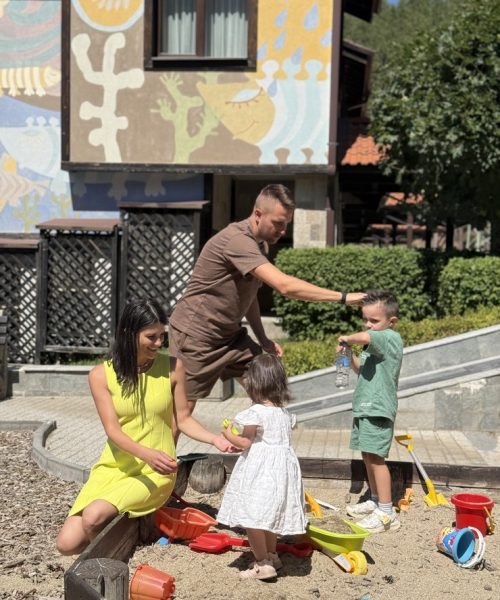 Family with children during a summer holiday at Ruskovets Resort in Pirin